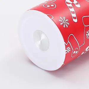Macro view showing the sturdy white base and festive Christmas print of a 20oz car cup