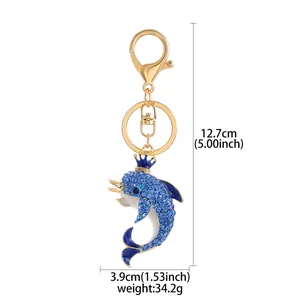 Detailed dimensions of blue rhinestone dolphin keychain with crown and gold-tone finish