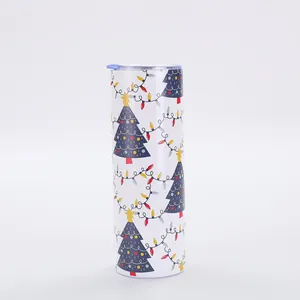 Detailed view of 20oz skinny vacuum insulated tumbler with festive Christmas tree pattern