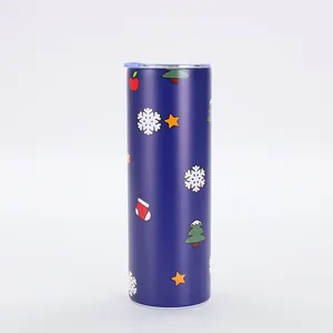Detailed view of 20oz Christmas themed blue insulated tumbler with snowflake patterns