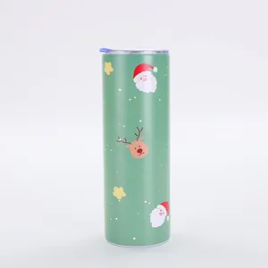 Detail view of a 20oz slim insulated Christmas tumbler with festive Santa and reindeer pattern