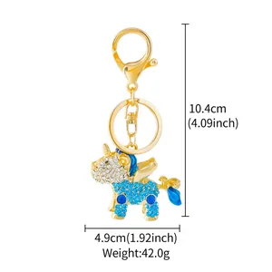 Detailed view of gold rhinestone unicorn keychain with size and weight specs