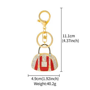 Detailed dimensions of the red rhinestone handbag keychain showing height and width