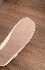 Macro view of anti-slip rubber sole texture for elegant Mary Jane ballet flats
