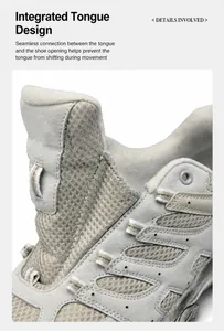 Détail macro de la languette intégrée sur des chaussures de randonnée grises respirantes
