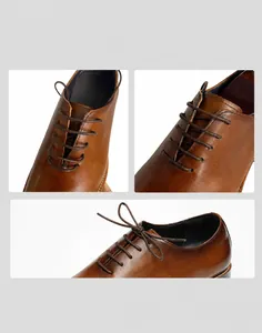 Gros plan de chaussures Richelieu en cuir marron montrant le laçage et la coupe étroite