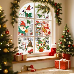Festliche Weihnachts-Gnom-Fensteraufkleber mit Schneeflocken für die Feiertagsdekoration.