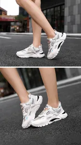 Detailed view of men's white breathable mesh sports sneakers with shock-absorbing sole