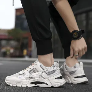Breathable white men's sneakers featuring lightweight mesh and cushioned soles for casual wear