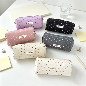 Selection of star-patterned canvas pencil cases featuring large capacity storage.