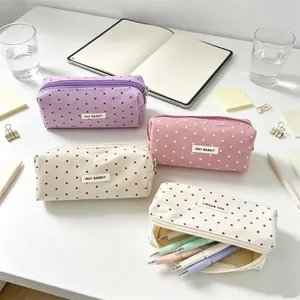 Detailed view of star-patterned large capacity pencil cases in multiple pastel colors