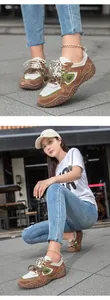 Close-up and lifestyle view of brown and white leather outdoor casual sneakers for women
