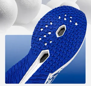 Close-up detail of the durable blue rubber outsole of a performance running shoe