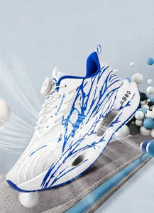 Detailed view of breathable mesh sports shoes with blue branch pattern and air cushion sole