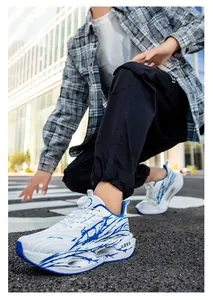 Detail shot of men's breathable popcorn running shoes with white and blue mesh pattern