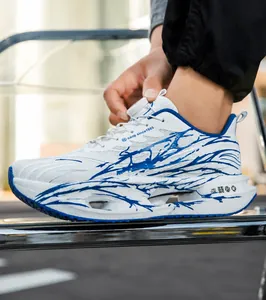 Breathable white running shoes with blue graphic patterns and convenient dial lacing system