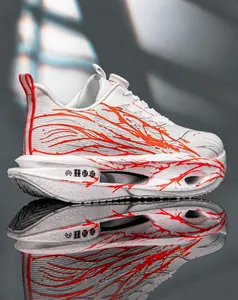 Close-up of white popcorn running shoe with vibrant red lightning pattern and mesh upper.
