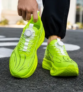 Vibrant neon green men's mesh running shoes featuring popcorn sole and dial lace system.