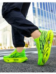 Vibrant neon green men's running shoes with mesh breathability and cushioned soles