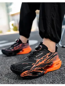 Detail view of breathable men's running shoes featuring vibrant orange flame patterns