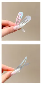 Detailed view of colorful plaid pattern and white metal BB hair clips for girls