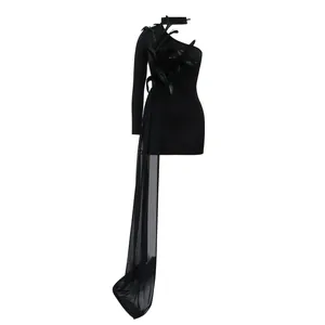 Close-up view of a sexy black off-shoulder mini dress with feathers and mesh drape