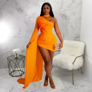 Sexy orange one-shoulder mini dress featuring feather trim and an elegant long side train