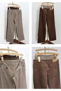 Gros plan de pantalon en velours côtelé vintage détaillant la texture et le zip