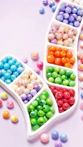 Macro view of various 16mm colorful electroplated UV acrylic beads for DIY jewelry.