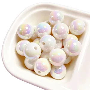 Close-up view of 16mm iridescent white UV-coated acrylic beads for DIY craft jewelry projects