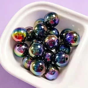 Close-up of 16mm iridescent electroplated UV acrylic beads for DIY jewelry and crafts