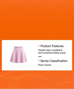 Détail de la jupe de sport rose avec taille double et short de sécurité intégré.