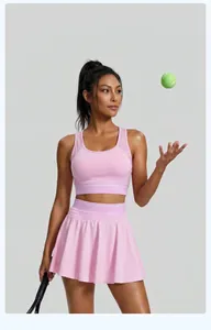 Ensemble de tennis rose avec soutien-gorge de sport et jupe à double taille