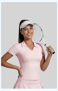 Slim fit pink athletic short sleeve polo shirt for women perfect for tennis and yoga