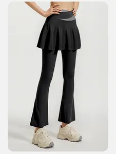 Detail view of black high-waisted flared yoga skort leggings with grey contrast waistband