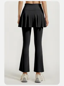 Back view of high-waist flare yoga leggings with integrated skirt detail