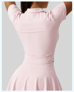 Detailed back view of pink slim fit athletic polo shirt for women's yoga and tennis