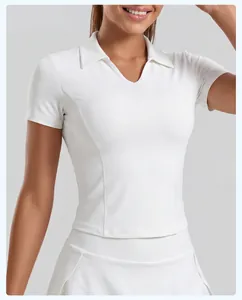 Detail showing the white slim fit polo V-neck of the women's sports T-shirt on a model