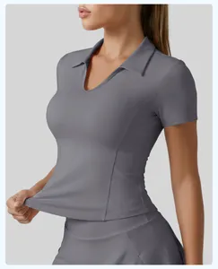 Close-up detail of grey slim fit polo yoga top featuring stretchable high-elastic fabric