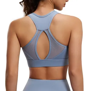 Blauwe racerback sportbeha met ademend mesh paneel en druppelvormige uitsnede achter voor sport