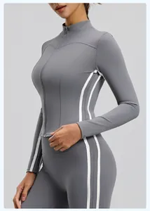 Close-up of side-striped grey yoga jacket showing slim fit and stand collar design