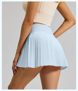 Detailed back view of a light blue pleated sports skort for summer fitness and tennis.