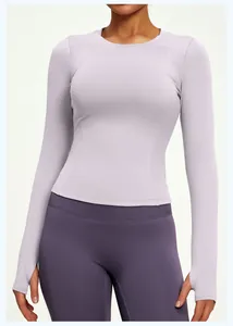 Detailed view of a slim-fit lavender long-sleeve yoga top with high-stretch fabric