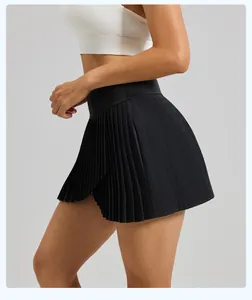 Side detail view of a high-quality black pleated sports skirt with a faux two-piece design