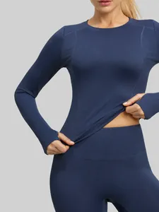 Navy blue slim fit long sleeve yoga top with thumb holes and high stretch fabric