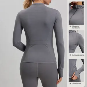 Veste de yoga de sport grise respirante avec coutures incurvées et passe-pouces