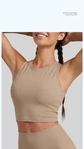 Detailed macro view of khaki high-neck sports bra highlighting premium fabric texture and seamless fit