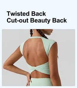Detailed macro view of mint green sports bra featuring an elegant hollow twist-back design