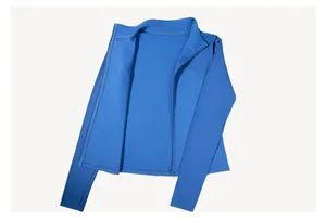 Close-up of blue slim-fit yoga jacket with ribbed sleeves and thumbholes