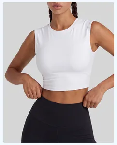 Detailed view of a white sports crop top highlighting its high-stretch fabric and fit.